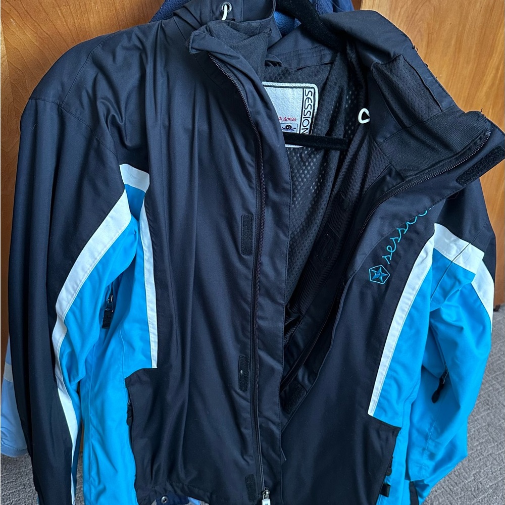 SESSIONS Dark Jacket with Blue Highlights